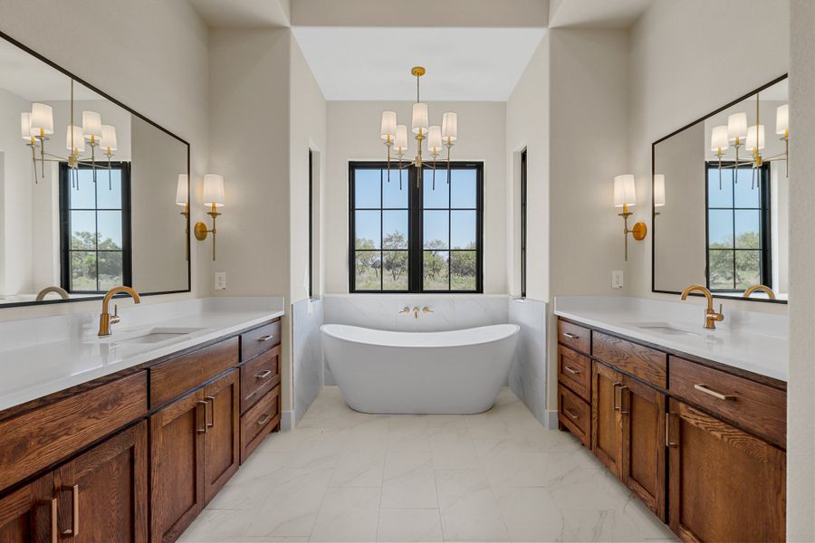 Furnished interior in a model home at Ranger Ridge in Strawn (Image 4).