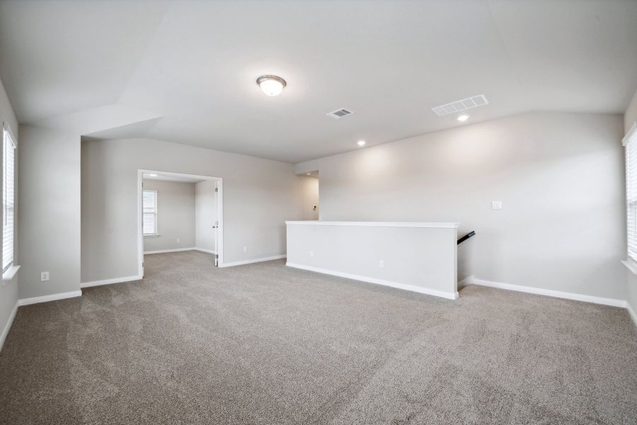 Second floor landing in the Reynolds floorplan at a Meritage Homes community.