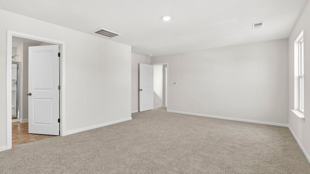 Spacious, unfurnished interior of a new home in Durbin Meadows Traditions, Fountain Inn (Image 32).