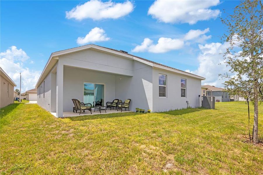Exterior details and patio area of a home in Cypress Park Estates, Haines City (Image 3).
