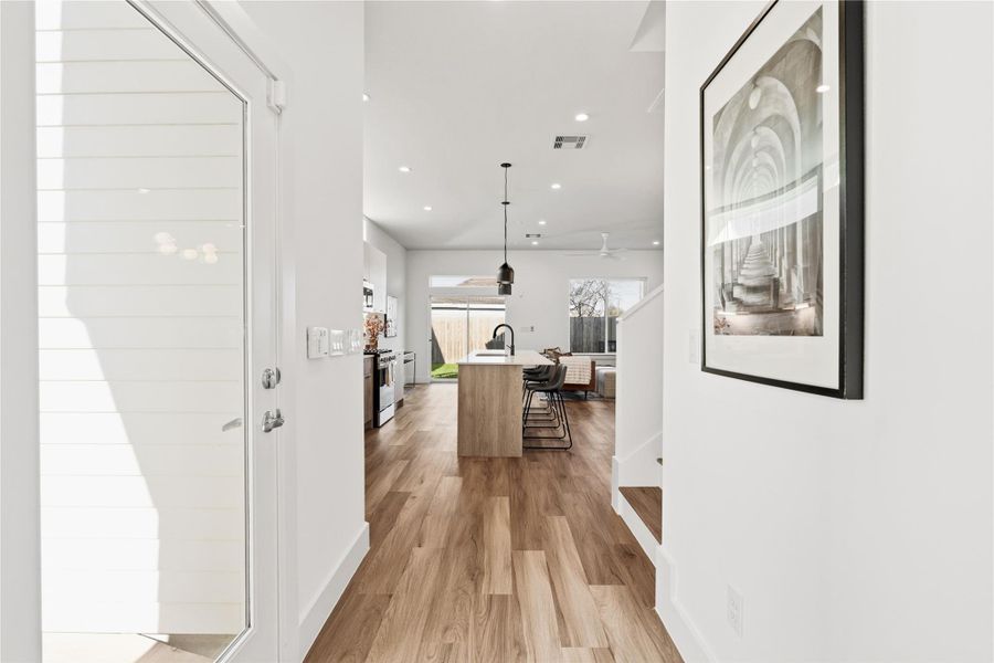 An inviting entry with wide-plank LVP flooring and 10-foot ceilings that set the tone from the start.