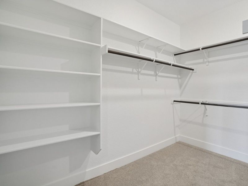 Primary Closet in the San Jacinto floorplan at a Meritage Homes community. Primary Closet in the San Jacinto floorplan at a Meritage Homes community.