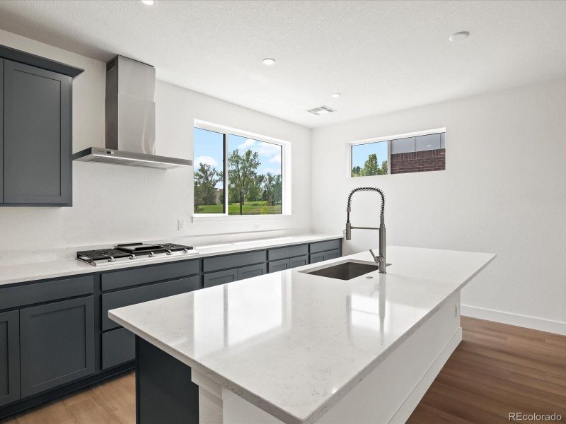 Furnished interior view inside a new home in Ascent at Inverness, Englewood (Image 6).