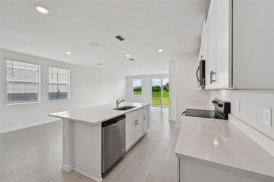 Furnished interior view inside a new home in Salt Meadows - Premier Series, Parrish (Image 5).