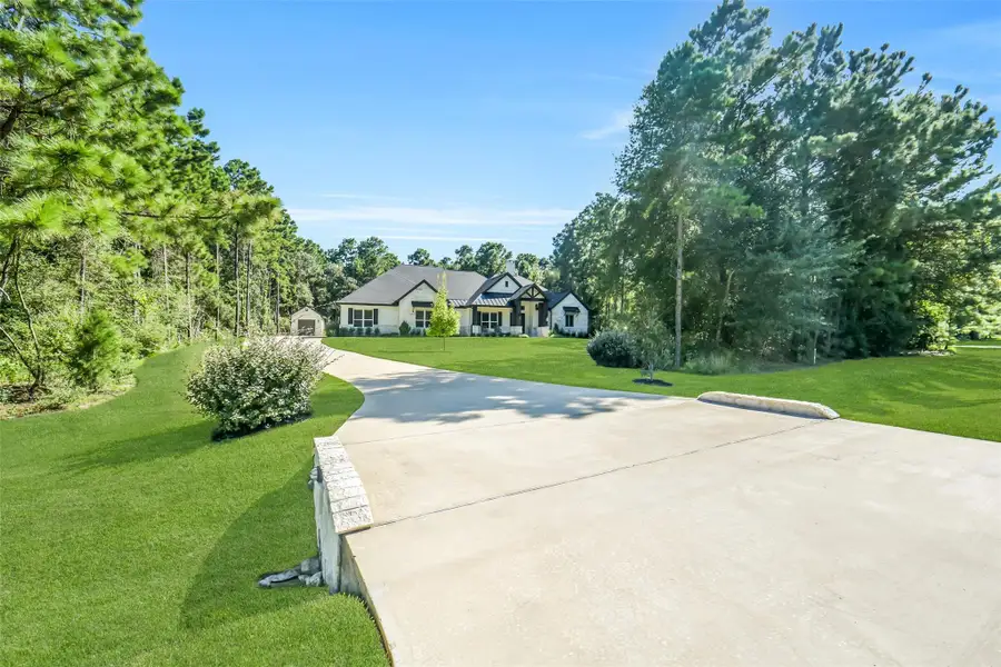 Front exterior of a new home in , Montgomery, TX, highlighting curb appeal (Image 2). Front exterior of a new home in , Montgomery, TX, highlighting curb appeal (Image 2).