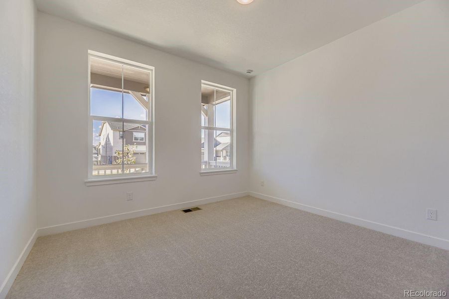 Spacious, unfurnished interior of a new home in Newlin Crossing: The Monarch Collection, Parker (Image 11). Spacious, unfurnished interior of a new home in Newlin Crossing: The Monarch Collection, Parker (Image 11).