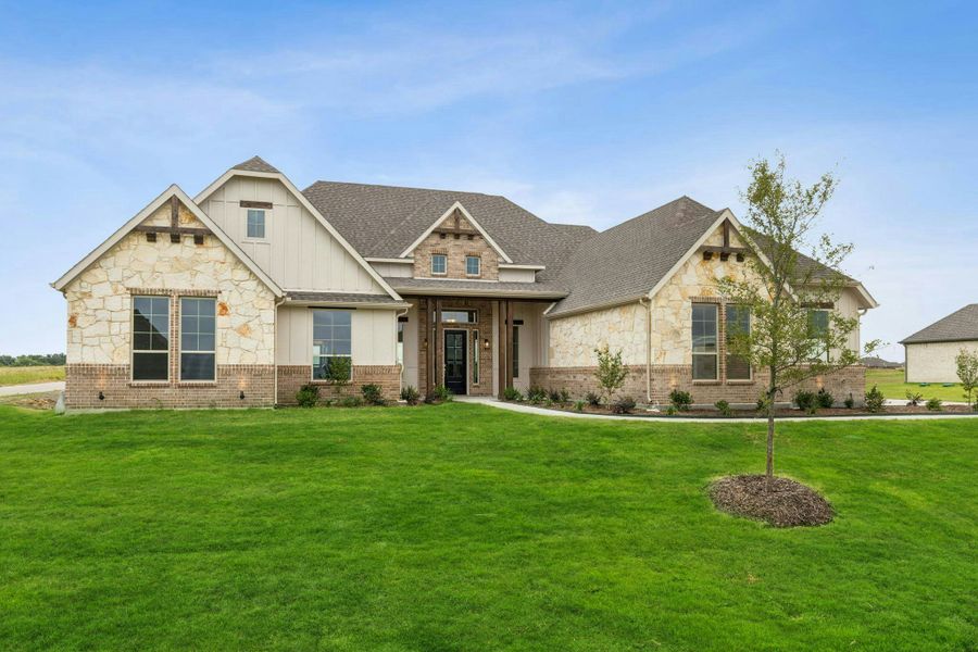 Representative exterior photo of a completed home built from the Sperry by Kindred Homes in Oak Creek Ranch, Waxahachie, TX (Image 22).