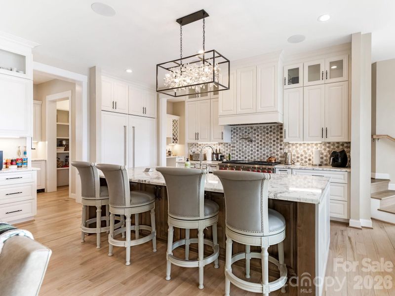 126" Long Island with dishwasher and farm style sink.