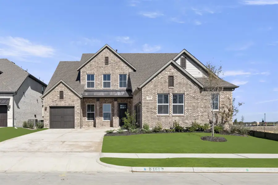 Representative exterior photo of a completed home built from the Louis - 70 ft Home Site by Rockwell Homes in Nelson Lake Estates, Rockwall, TX (Image 1). Representative exterior photo of a completed home built from the Louis - 70 ft Home Site by Rockwell Homes in Nelson Lake Estates, Rockwall, TX (Image 1).