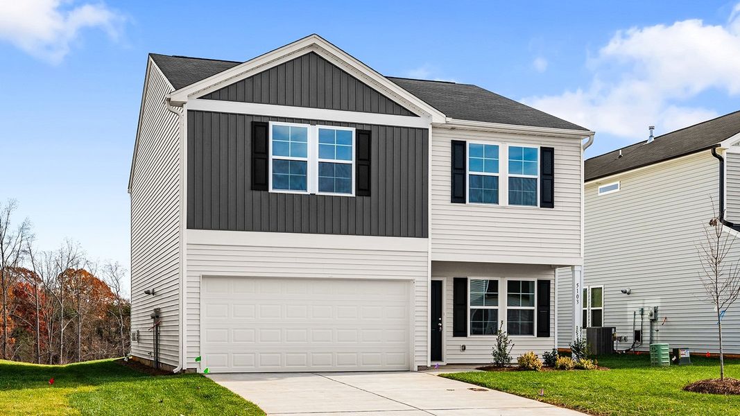 Front exterior of a new home in Bell West, Kernersville, NC, highlighting curb appeal (Image 2).