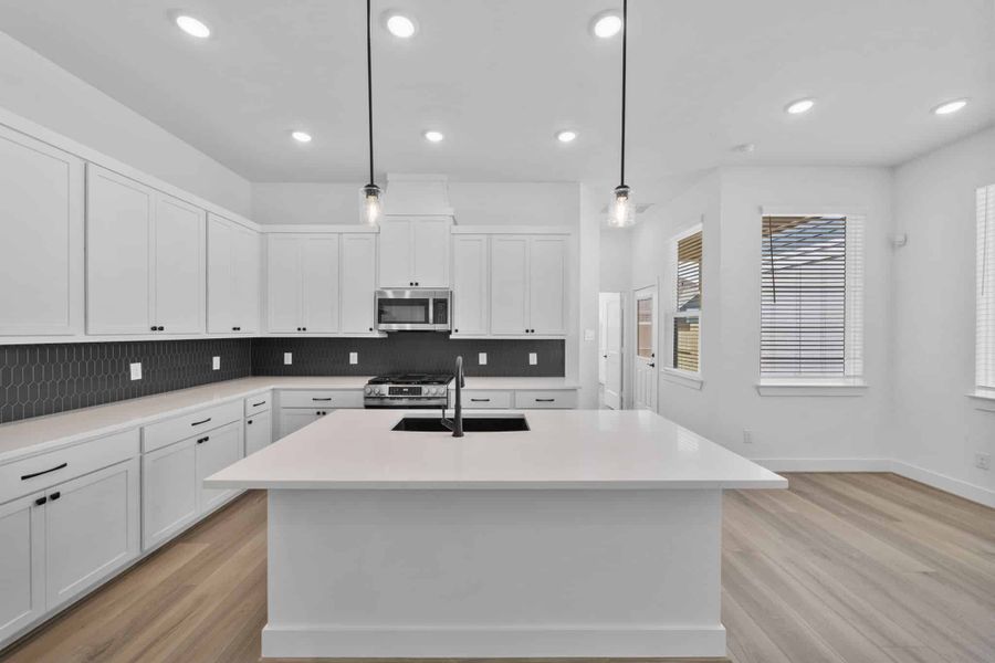 Furnished interior view inside a new home in Meridiana, Manvel (Image 6).