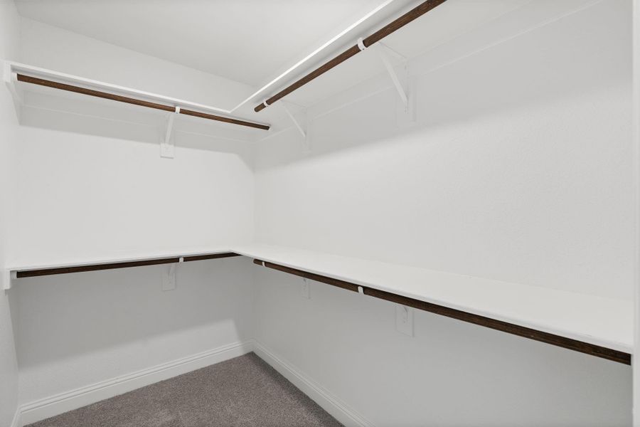 Spacious, unfurnished interior of a new home in Sunterra, Katy (Image 22).