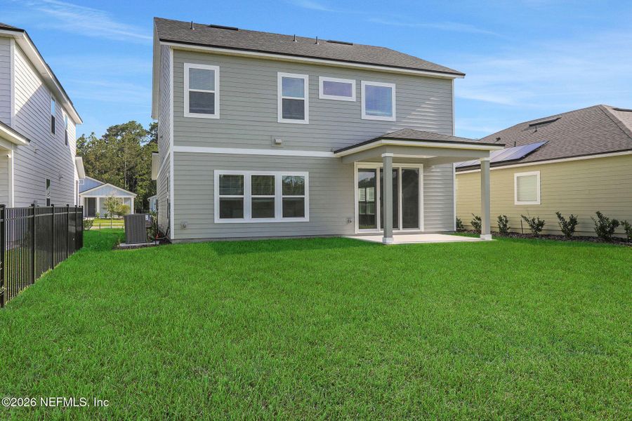 Exterior details and patio area of a home in Hyland Trail, Green Cove Springs (Image 29).