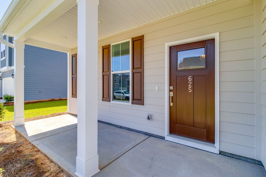Exterior details and patio area of a home in Pebble Branch, Chapin (Image 3). Exterior details and patio area of a home in Pebble Branch, Chapin (Image 3).