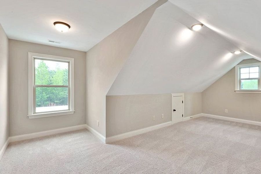 Representative unfurnished interior of a home built from the Grovetown by Dustin Shaw Homes in Durham Estates, Sharpsburg (Image 24).