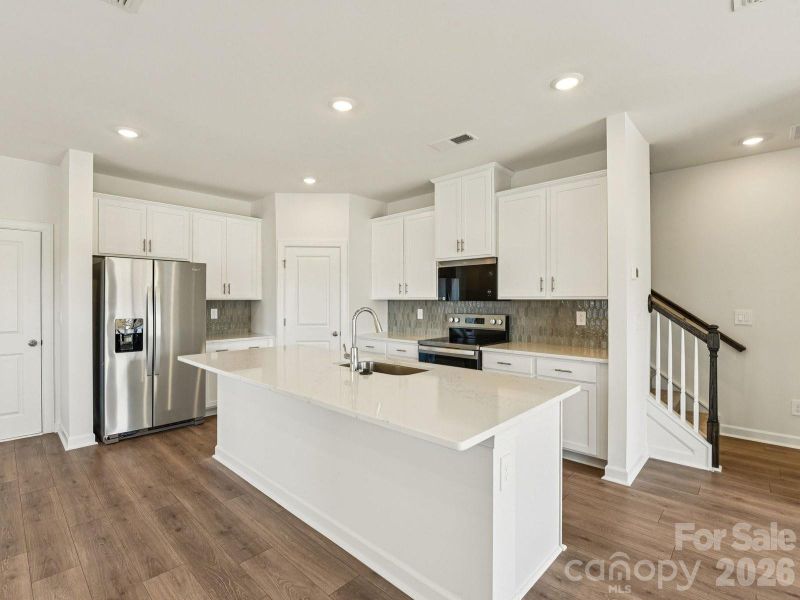 Photo is not of the actual home, but is an inspirational photo of builder’s model home and may depict options, furnishings, and/or decorator features that are not included