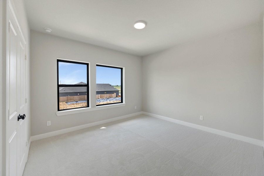 Spacious, unfurnished interior of a new home in Sienna - Grove Collection, Missouri City (Image 19). Spacious, unfurnished interior of a new home in Sienna - Grove Collection, Missouri City (Image 19).