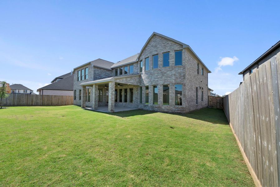 Exterior details and patio area of a home in Harvest Green, Richmond (Image 24).