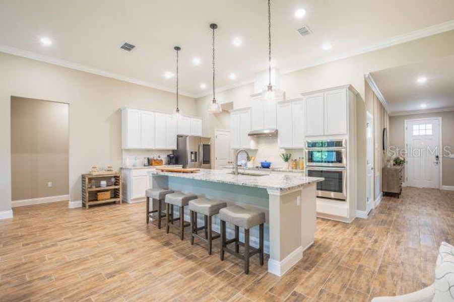 Furnished interior view inside a new home in Royal Highlands, Weeki Wachee (Image 5).