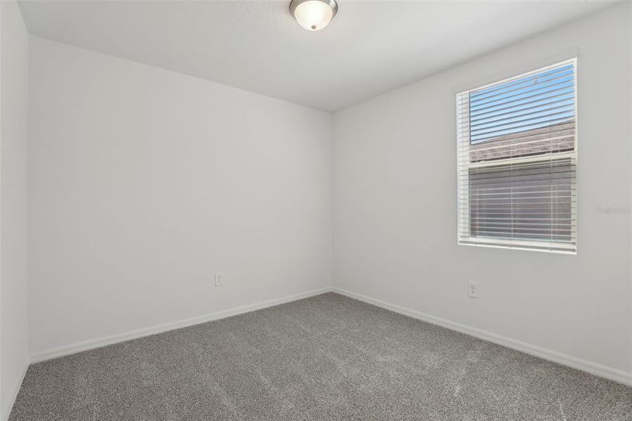 Spacious, unfurnished interior of a new home in Lawson Dunes - Signature Series, Haines City (Image 29).