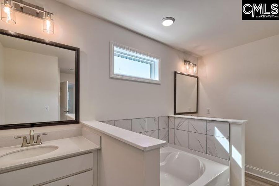 Furnished interior view inside a new home in Cottages at Roofs Pond, West Columbia (Image 9).