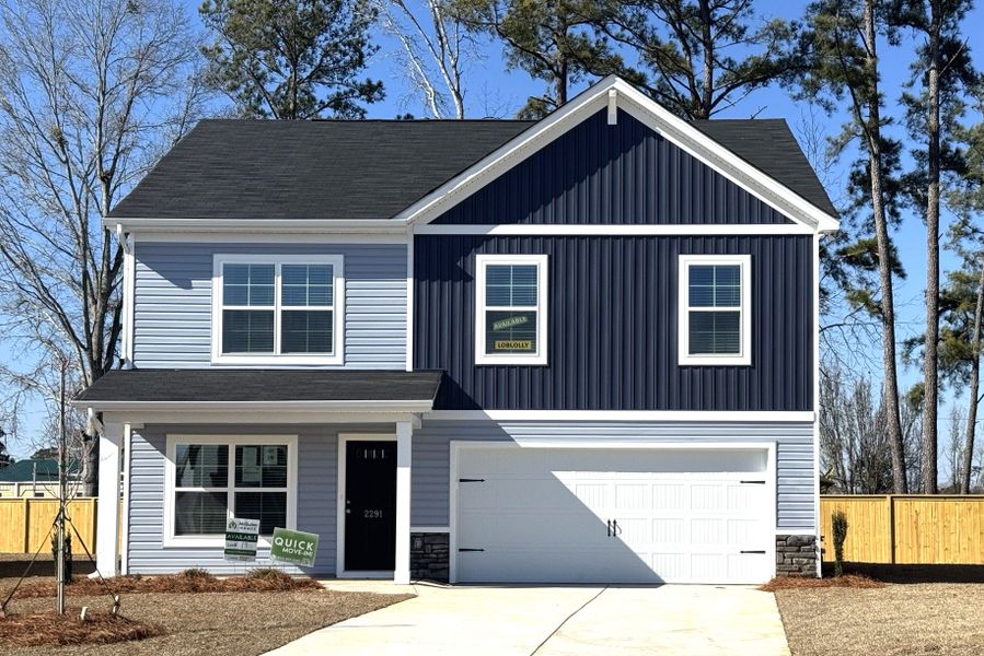 Front exterior of a new home in Crystal Downs, Sumter, SC, highlighting curb appeal (Image 2). Front exterior of a new home in Crystal Downs, Sumter, SC, highlighting curb appeal (Image 2).