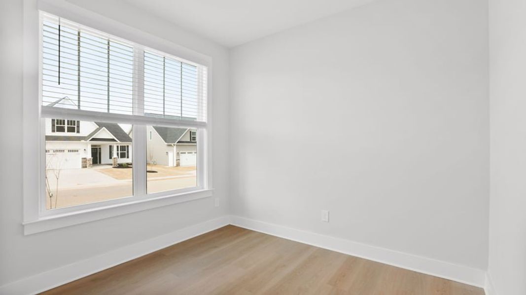 Representative unfurnished interior of a home built from the Bakersfield by D.R. Horton in Edgewood Estates, Greenville (Image 16).