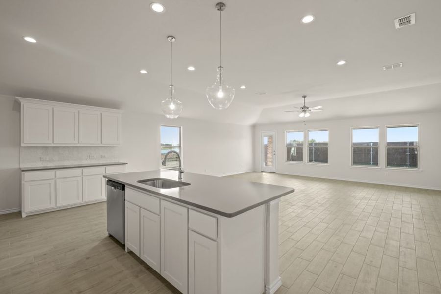 Front exterior of a new home in Myrtle Creek, Waxahachie, TX, highlighting curb appeal (Image 10). Front exterior of a new home in Myrtle Creek, Waxahachie, TX, highlighting curb appeal (Image 10).