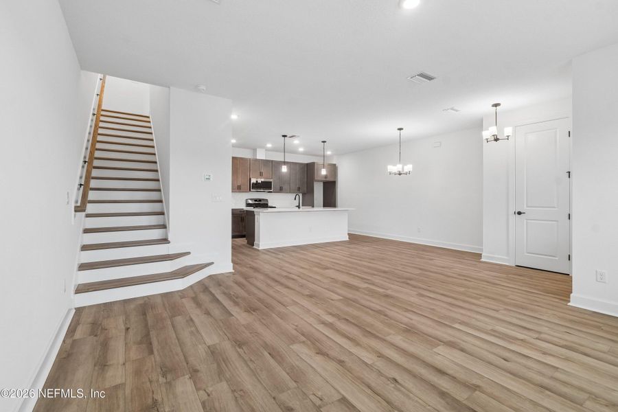 Spacious, unfurnished interior of a new home in Westerly Park at Wildlight - Courtyard Collection, Yulee (Image 26).
