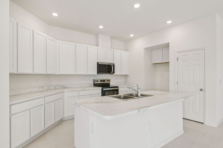 Furnished interior view inside a new home in The Preserve at Legends Pointe II, Hudson (Image 3).