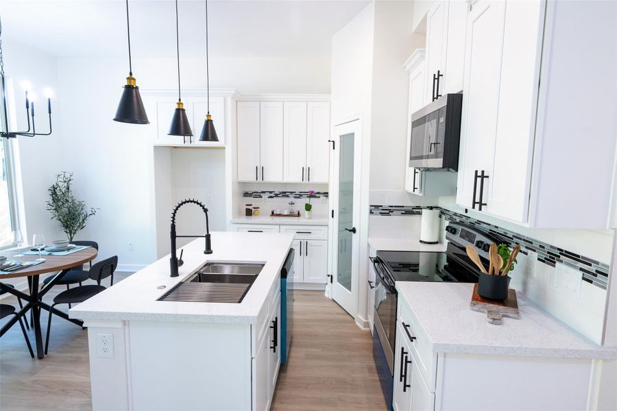 Furnished interior view inside a new home in , Conroe (Image 8).