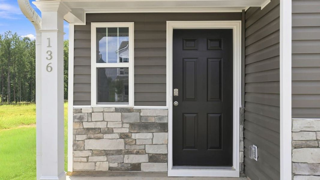 Exterior details and patio area of a home in Tyger Pines, Moore (Image 3).