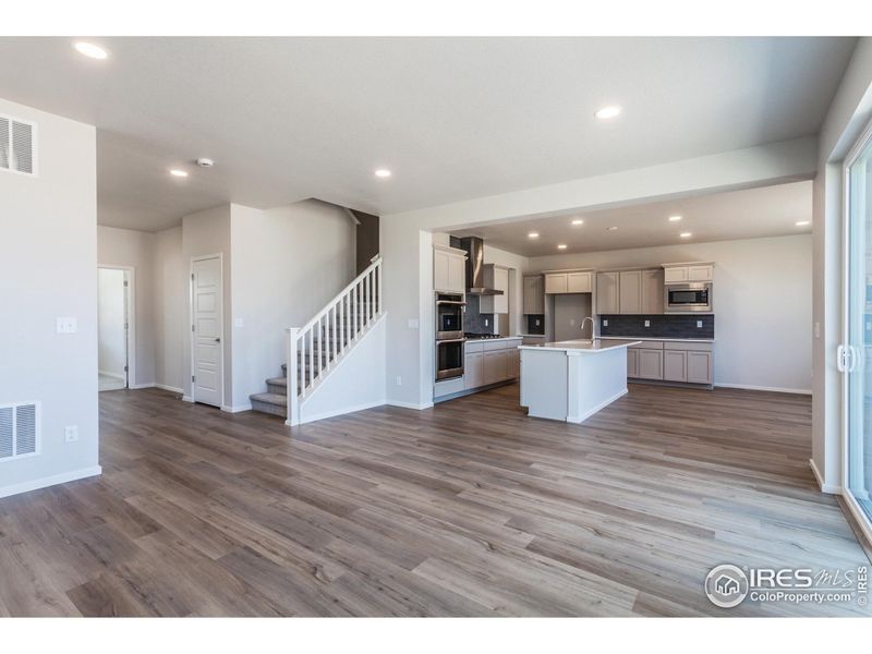 LIVING ROOM OPEN TO KITCHEN