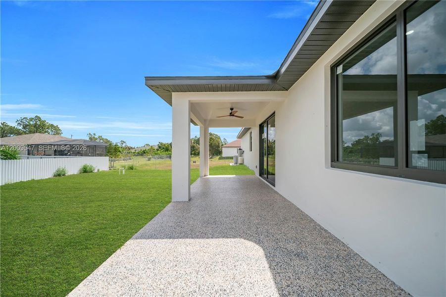 Exterior details and patio area of a home in , Lehigh Acres (Image 4).