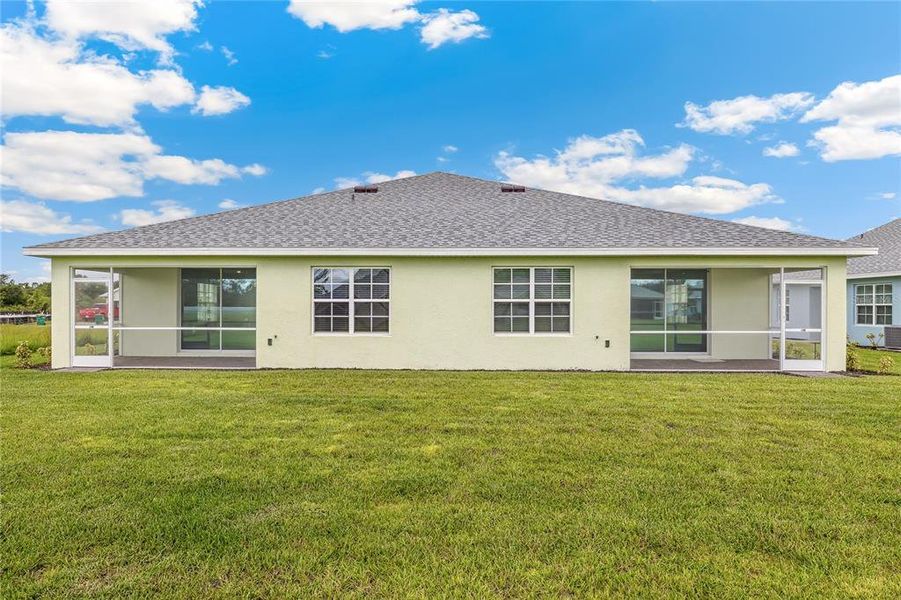 Exterior details and patio area of a home in Heritage Lake Park, Punta Gorda (Image 2).