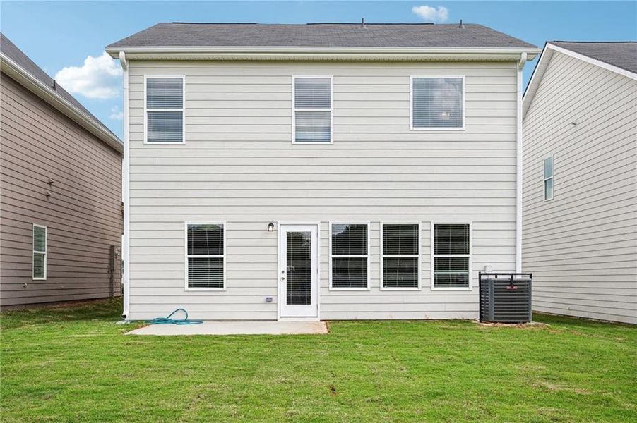 Exterior details and patio area of a home in Fairview Lake, Conyers (Image 4).