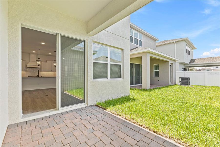 Exterior details and patio area of a home in Osprey Ranch, Winter Garden (Image 4).