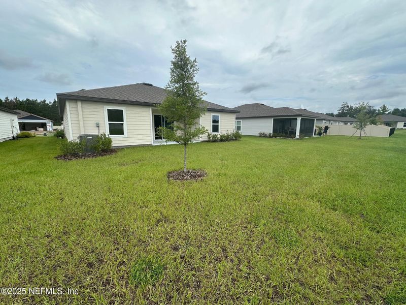 Front exterior of a new home in , Hilliard, FL, highlighting curb appeal (Image 1). Front exterior of a new home in , Hilliard, FL, highlighting curb appeal (Image 1).