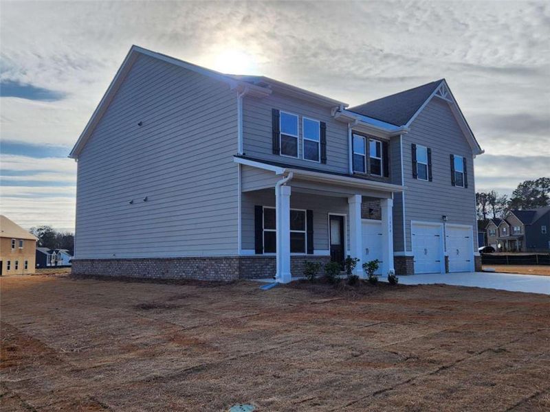 Exterior details and patio area of a home in Southern Hills, McDonough (Image 4).
