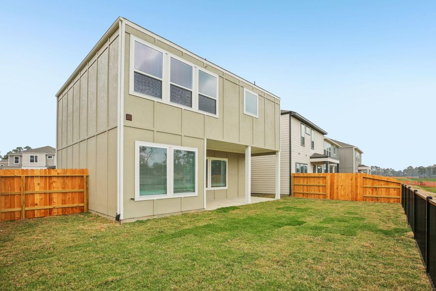 Exterior details and patio area of a home in Pinewood Trails - Luxe Series, Atascocita (Image 3). Exterior details and patio area of a home in Pinewood Trails - Luxe Series, Atascocita (Image 3).