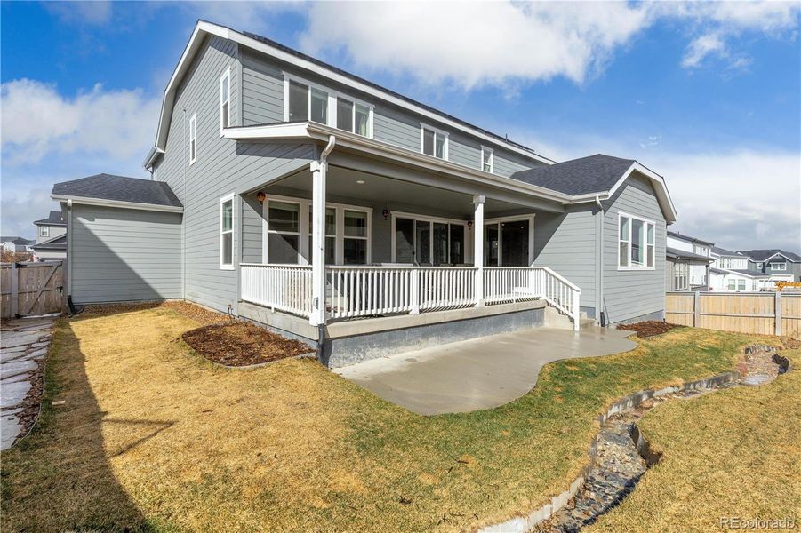Exterior details and patio area of a home in Looking Glass, Parker (Image 21).