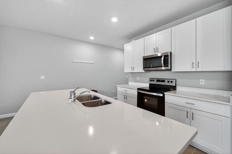 Furnished interior view inside a new home in Enclave at Mangonia Park, West Palm Beach (Image 28).