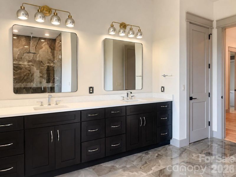Dual vanity with generous storage and designer finishes