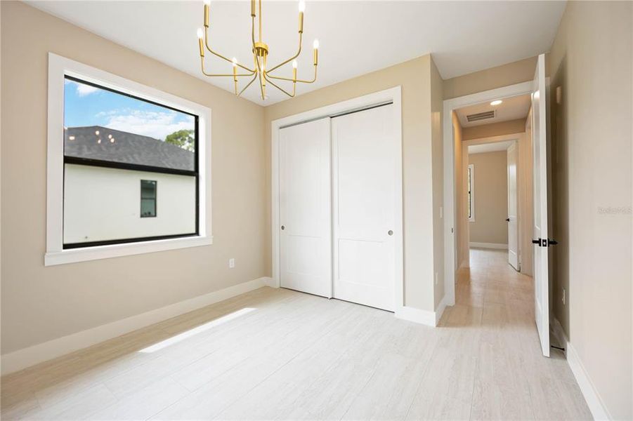 Spacious, unfurnished interior of a new home in , Port Charlotte (Image 24).