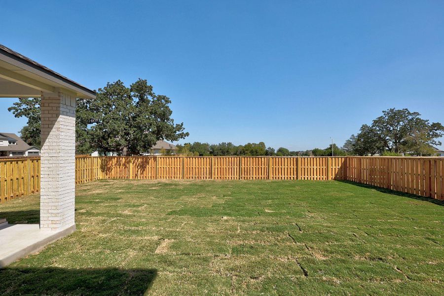 Exterior details and patio area of a home in Parmer Ranch, Georgetown (Image 24). Exterior details and patio area of a home in Parmer Ranch, Georgetown (Image 24).