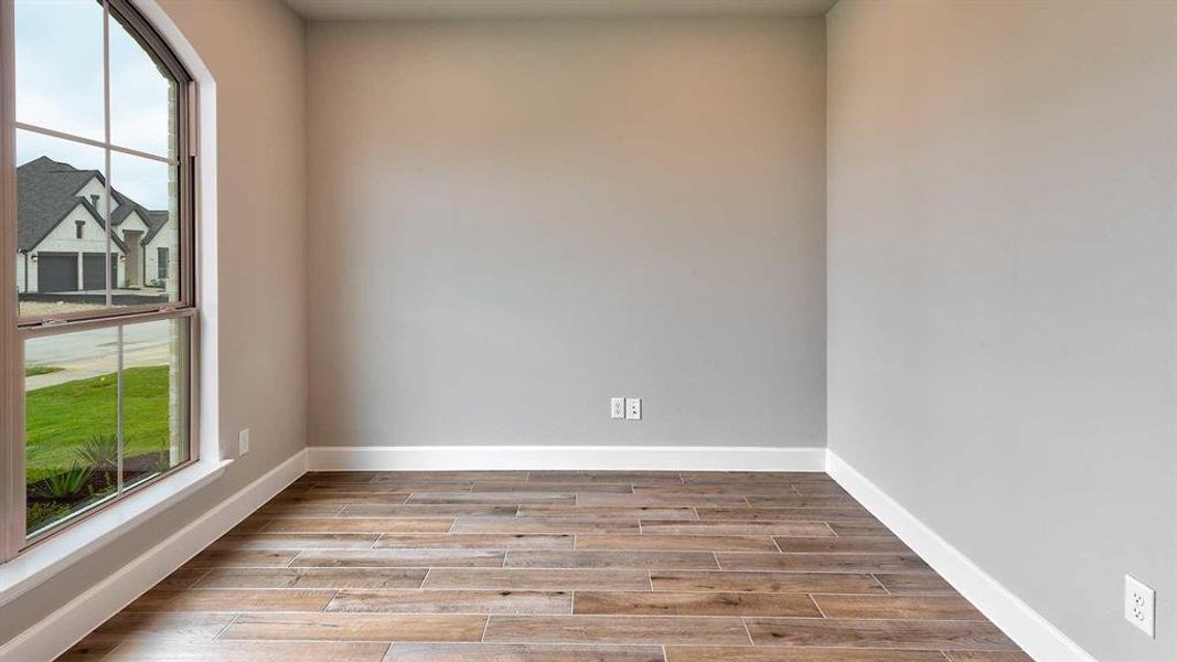 Empty room featuring light wood-type flooring