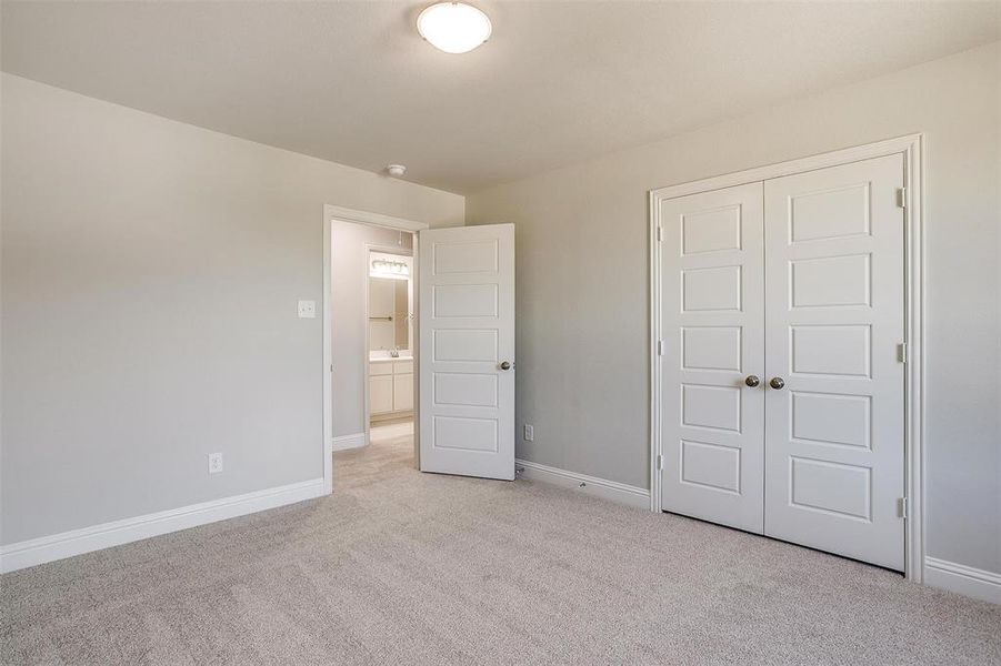 Bathroom with double vanity, a stall shower, ceiling fan, and recessed lighting