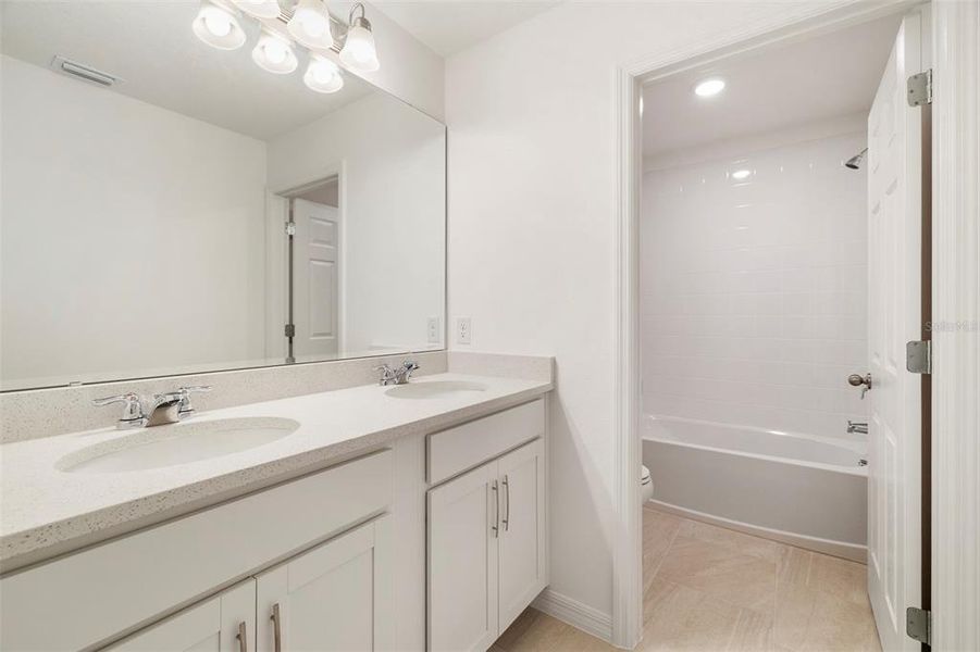 Furnished interior view inside a new home in Preservation Pointe, Davenport (Image 4). Furnished interior view inside a new home in Preservation Pointe, Davenport (Image 4).