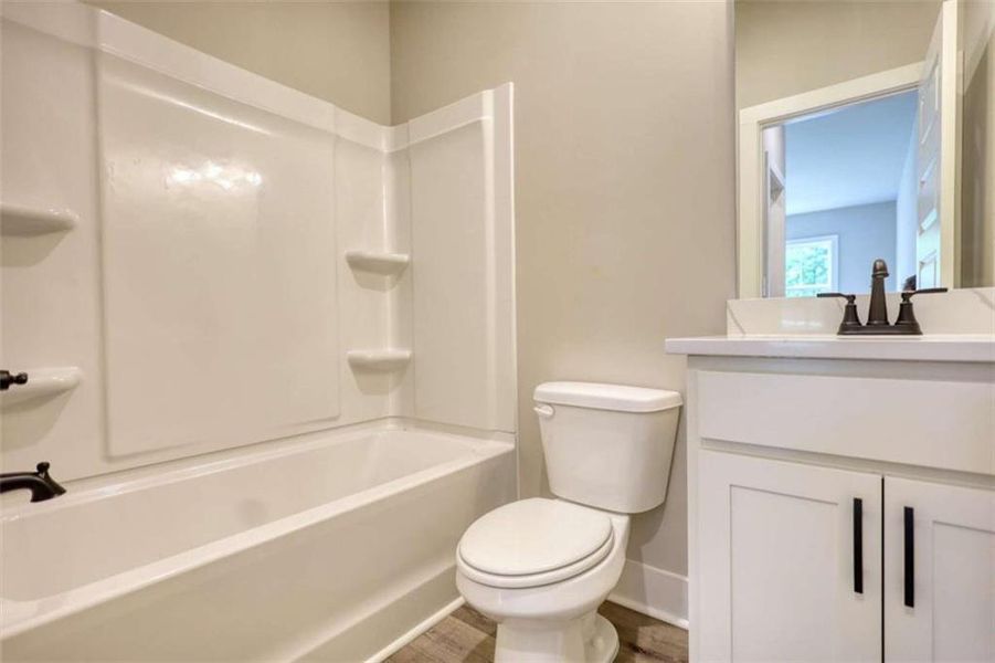 Furnished interior view inside a new home in , Monticello (Image 9).