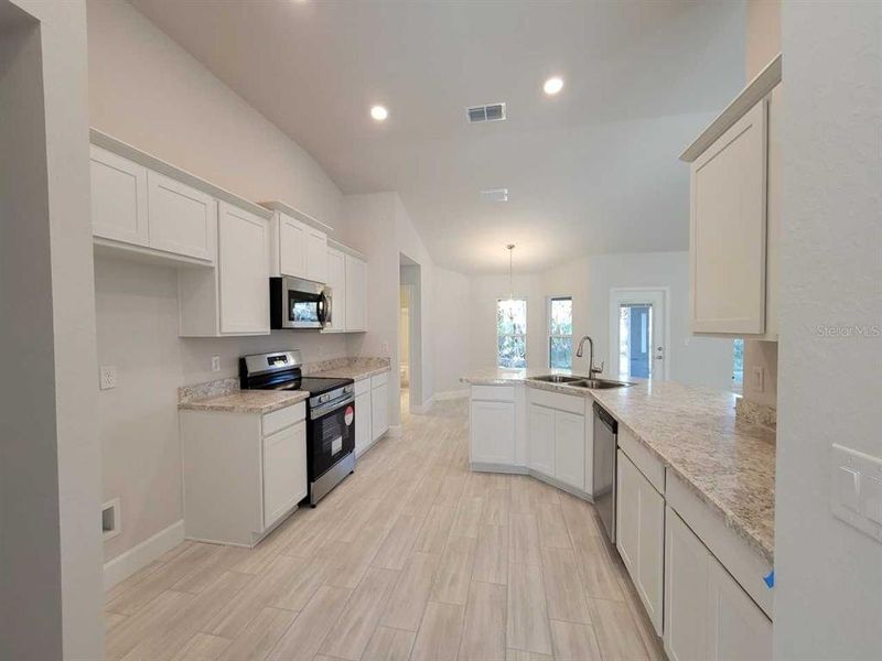 Picture of similar home for illustrative purposes only.   Colors and features will vary!